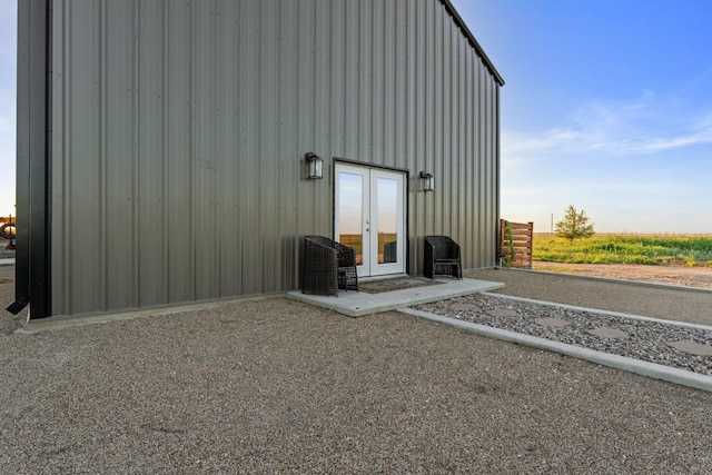 back of property featuring french doors