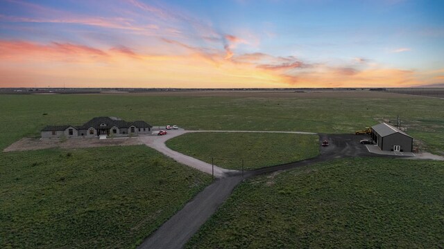 aerial view at dusk with a rural view