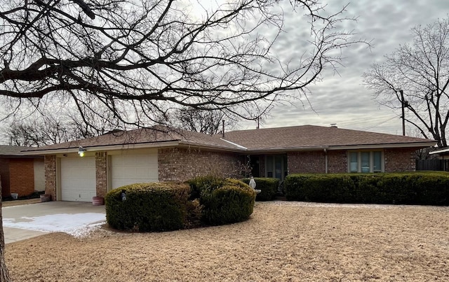 ranch-style house featuring a garage