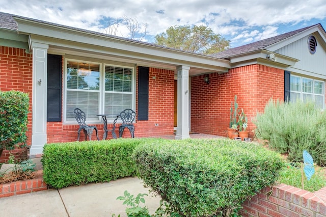 doorway to property with a porch