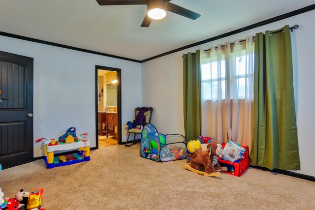 game room with crown molding and light colored carpet