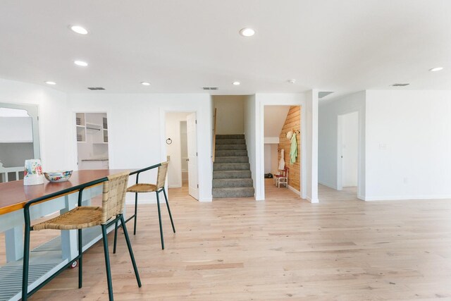 dining area with light hardwood / wood-style flooring