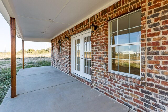 view of patio featuring french doors