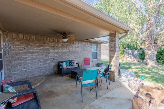 view of patio featuring ceiling fan and an outdoor living space