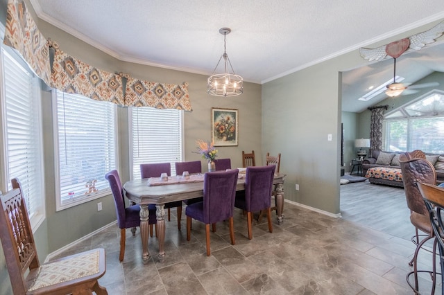 dining area with crown molding, vaulted ceiling, ceiling fan with notable chandelier, and a textured ceiling