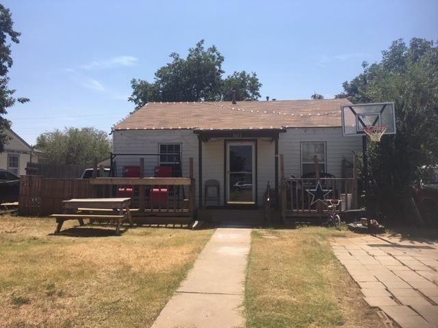 exterior space with a front yard