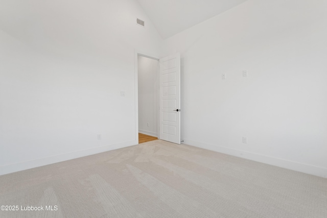 4806 139th St, Lubbock, TX 79424 - unfurnished room with vaulted ceiling, light carpet, and baseboards