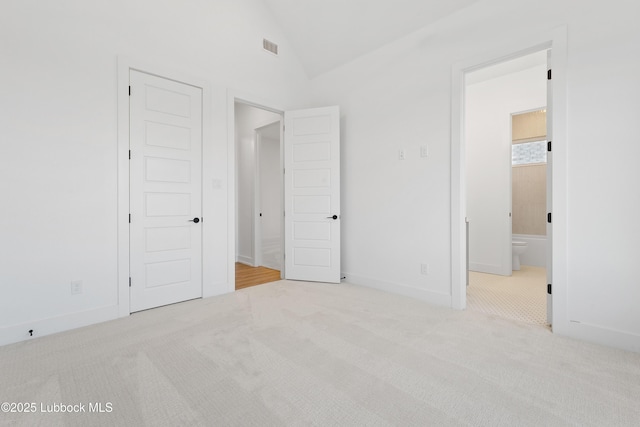4806 139th St, Lubbock, TX 79424 - unfurnished bedroom featuring lofted ceiling, carpet flooring, ensuite bathroom, and baseboards