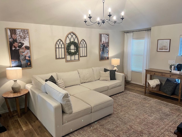 7022 34th Pl, Lubbock, TX 79407 - living room with a chandelier, wood finished floors, and lofted ceiling