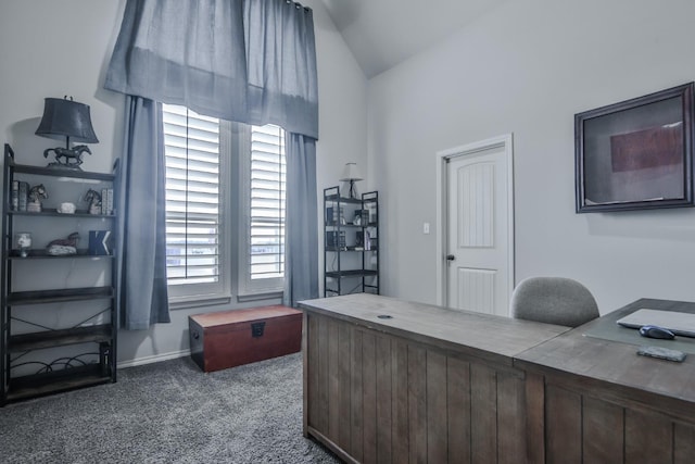 carpeted office space with lofted ceiling