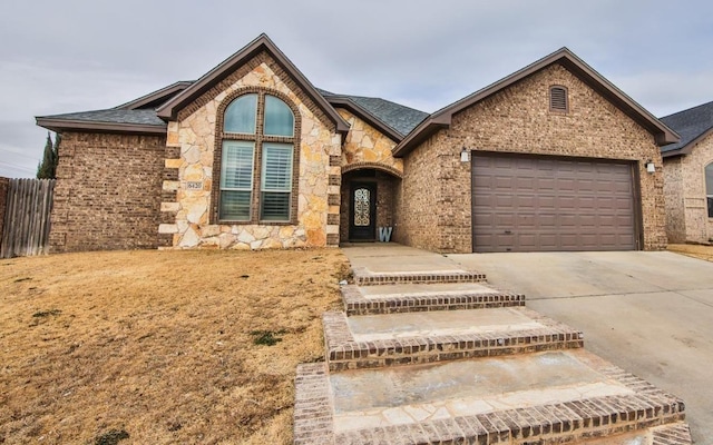 view of front of home with a garage