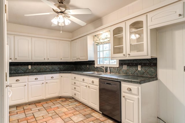 kitchen with white cabinetry, black dishwasher, and sink