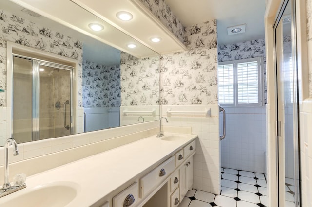 bathroom featuring vanity and walk in shower