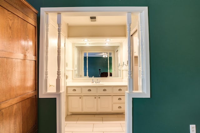 bathroom featuring tile patterned floors and vanity