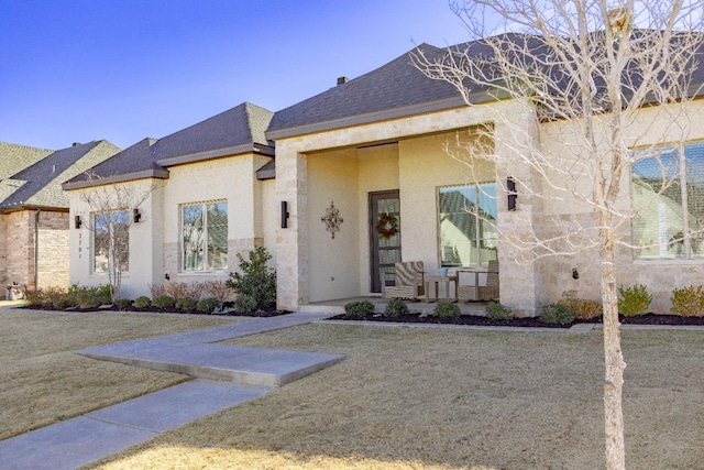 view of front of home with a front yard