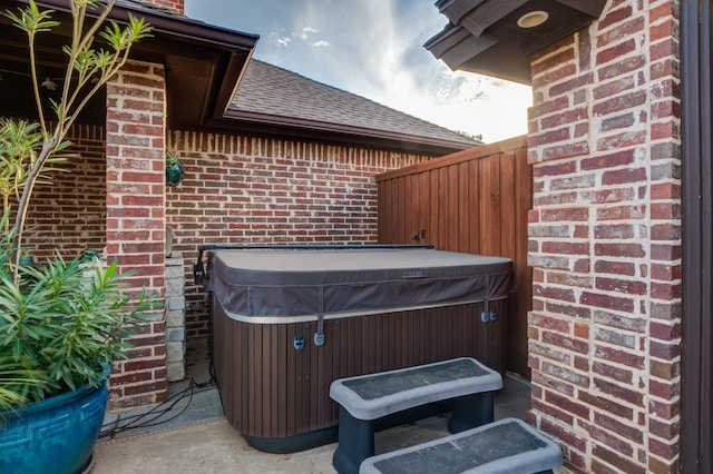 view of patio featuring a hot tub