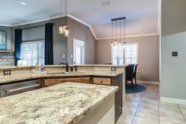 kitchen with sink, crown molding, hanging light fixtures, light tile patterned floors, and stainless steel dishwasher