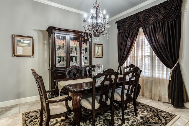 tiled dining room with ornamental molding and a chandelier