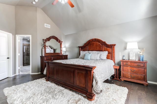 bedroom with dark wood-type flooring, ceiling fan, and lofted ceiling