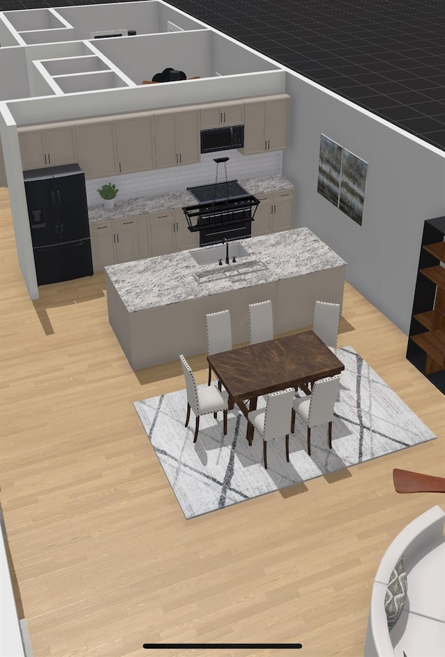 dining area with crown molding, sink, and light hardwood / wood-style flooring