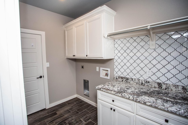 laundry area with cabinets, electric dryer hookup, and washer hookup