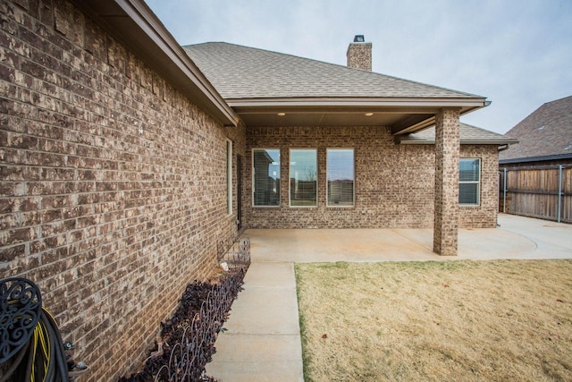 back of house with a patio area