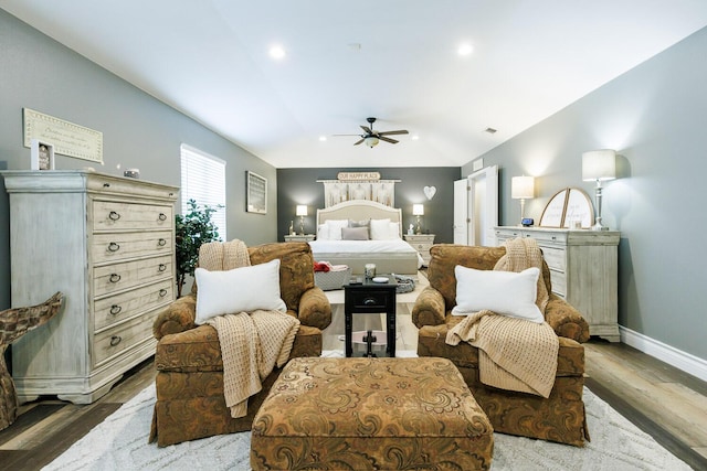 bedroom featuring lofted ceiling, wood finished floors, recessed lighting, baseboards, and ceiling fan