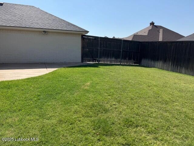 4020 125th St, Lubbock, TX 79423 - fenced backyard featuring a patio area