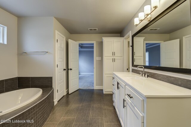 4020 125th St, Lubbock, TX 79423 - bathroom featuring vanity and a bath