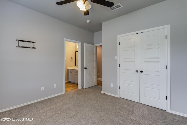 4020 125th St, Lubbock, TX 79423 - unfurnished bedroom with carpet flooring, a closet, ensuite bath, and a ceiling fan