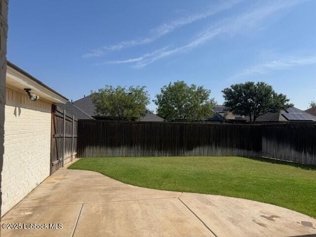 4020 125th St, Lubbock, TX 79423 - fenced backyard featuring a patio