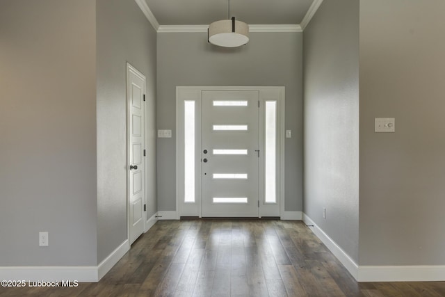 4020 125th St, Lubbock, TX 79423 - foyer with ornamental molding and dark wood-style flooring