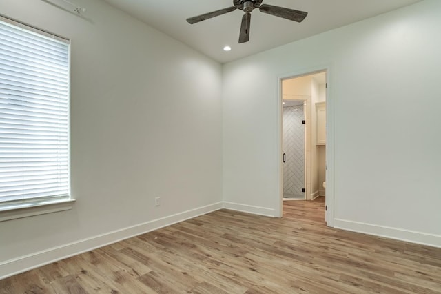 unfurnished room with light hardwood / wood-style flooring and ceiling fan