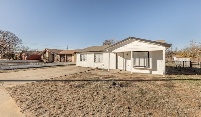 2004 Date Ave, Lubbock, TX 79404 - rear view of property with a yard