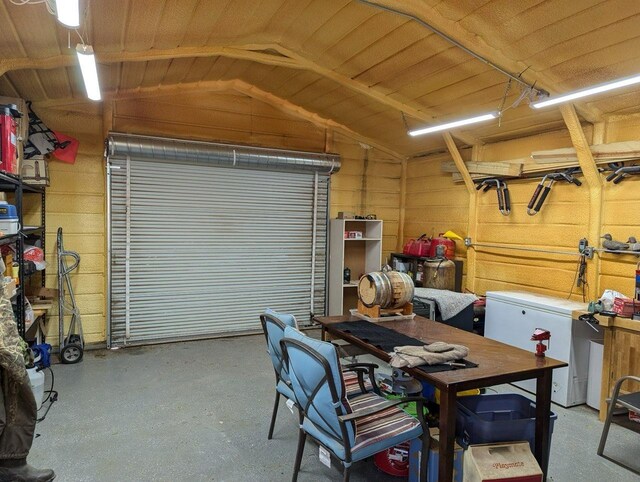 garage featuring refrigerator