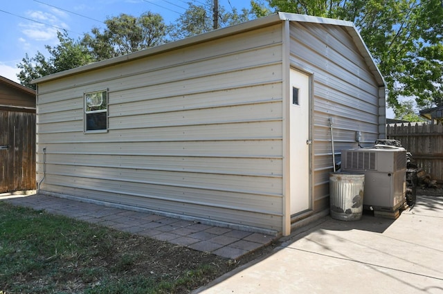 view of outbuilding with cooling unit