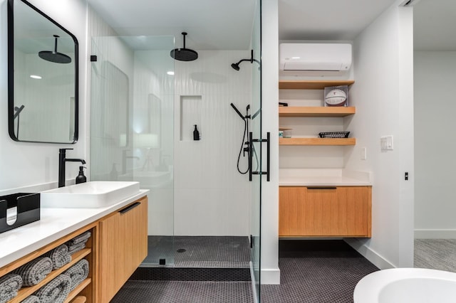 bathroom featuring a shower stall, vanity, baseboards, and a wall mounted AC