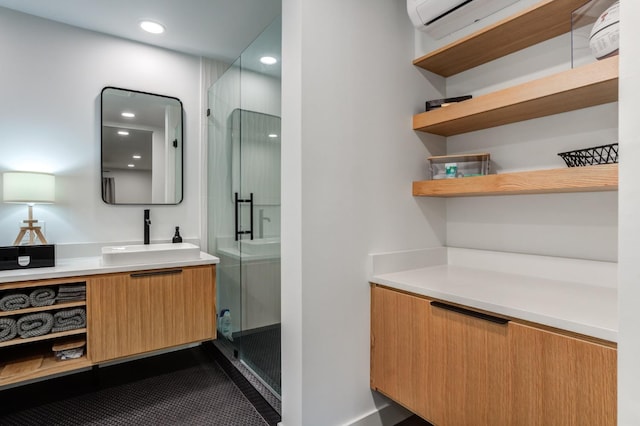 full bathroom with a stall shower, vanity, and recessed lighting