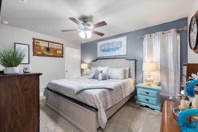 bedroom with light colored carpet and ceiling fan