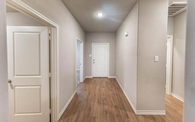 hallway featuring light hardwood / wood-style floors