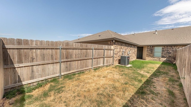 view of yard featuring central AC