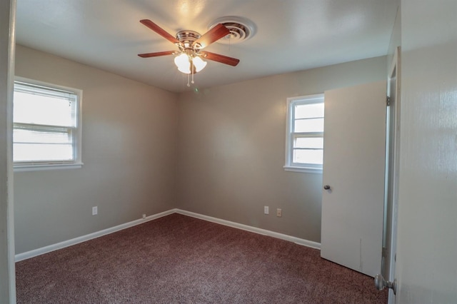 unfurnished room with carpet flooring and ceiling fan