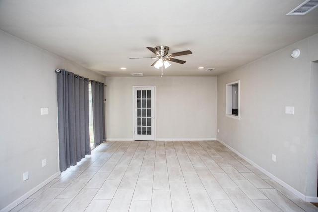 empty room featuring ceiling fan