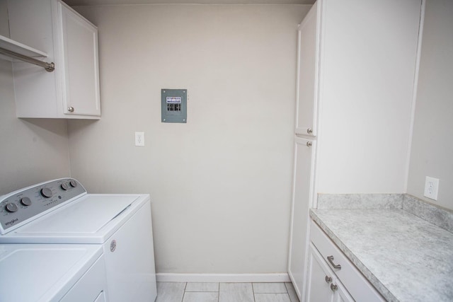 laundry area with cabinets and independent washer and dryer