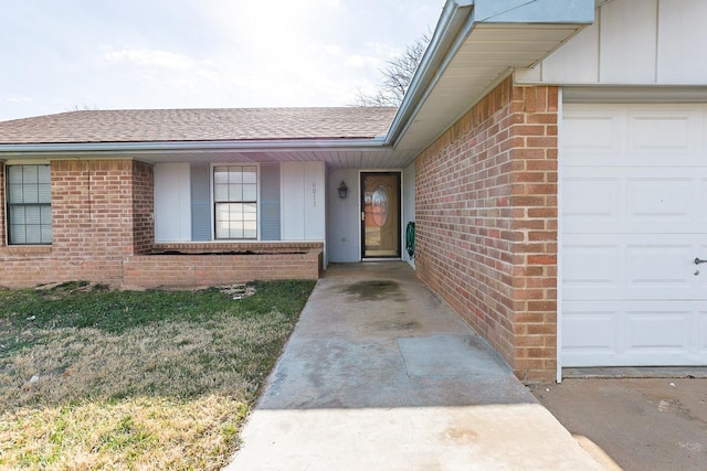 property entrance with a garage