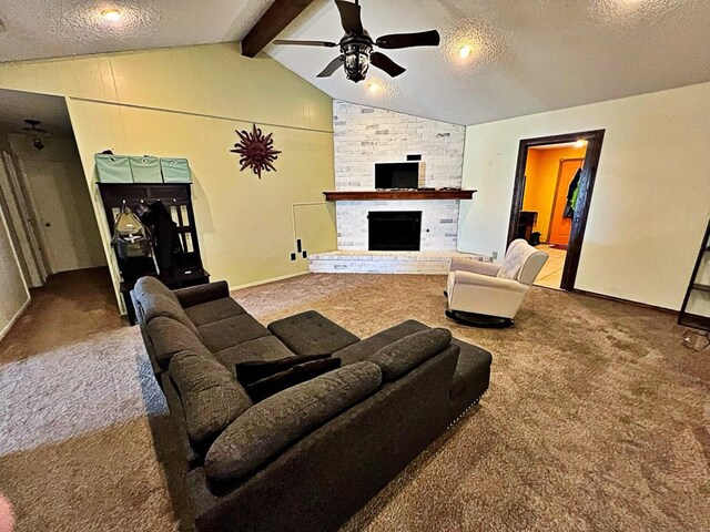 living room featuring a brick fireplace, carpet floors, vaulted ceiling with beams, and a textured ceiling