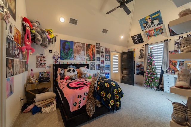 bedroom with high vaulted ceiling, ceiling fan, and carpet flooring