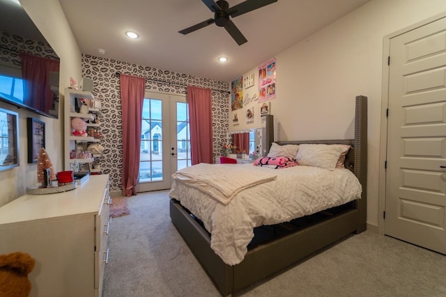 carpeted bedroom with access to outside, ceiling fan, and french doors