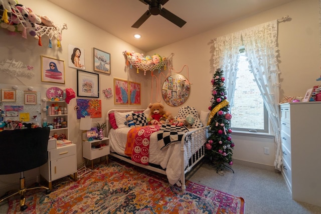 carpeted bedroom featuring ceiling fan