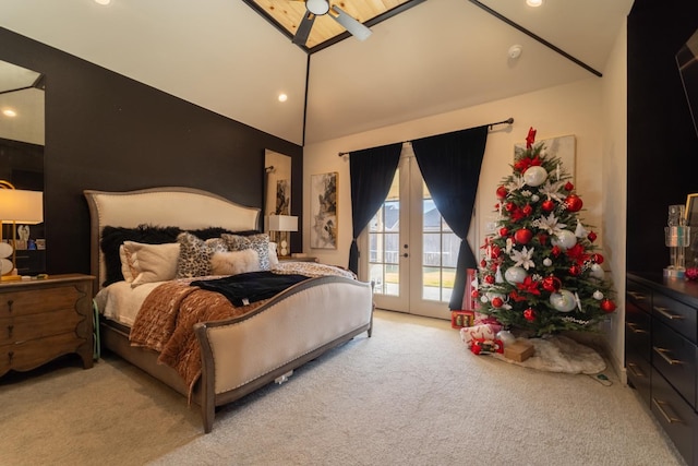 bedroom featuring access to outside, light colored carpet, french doors, and vaulted ceiling